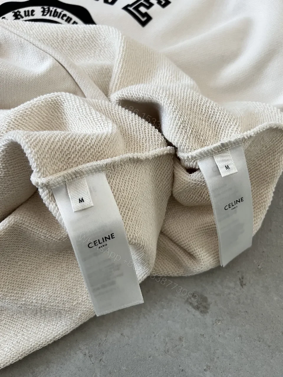 View 7 of Bold Contrast Crest Sweatshirt - Cream Body, Black Sleeves, Luxe Comfort