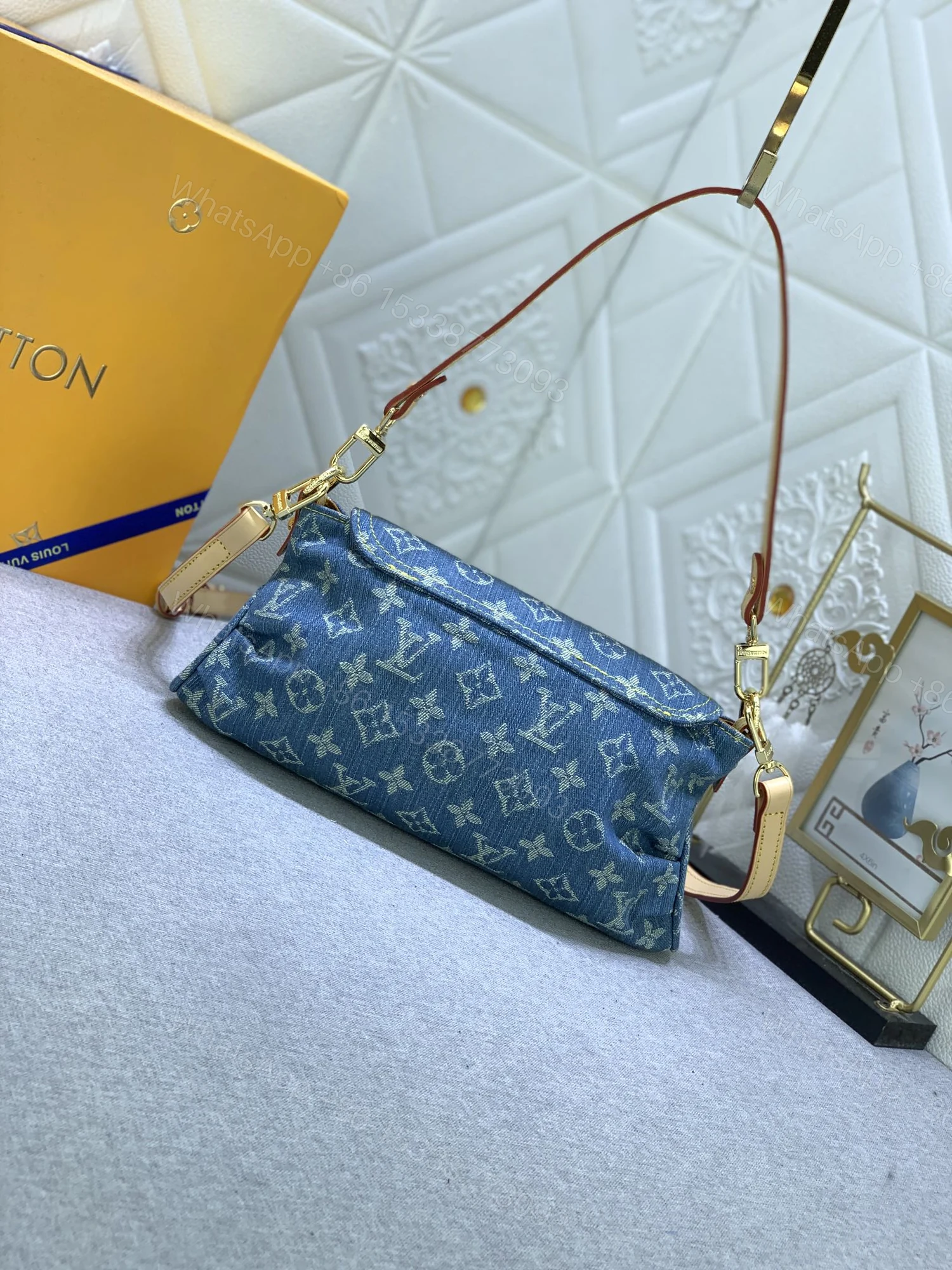 View 7 of Louis Vuitton Pleaty bag in blue denim
