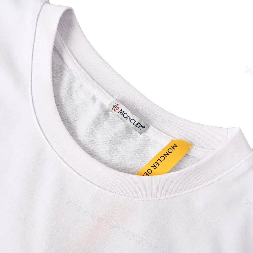View 2 of Lightweight White Tee with Subtle Moncler Logo, Modern, Ultra-Comfortable