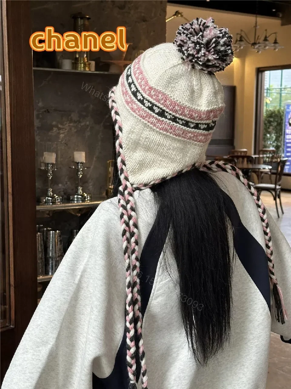View 3 of Chic Knit Pom Beanie with Braided Tie-Through Straps