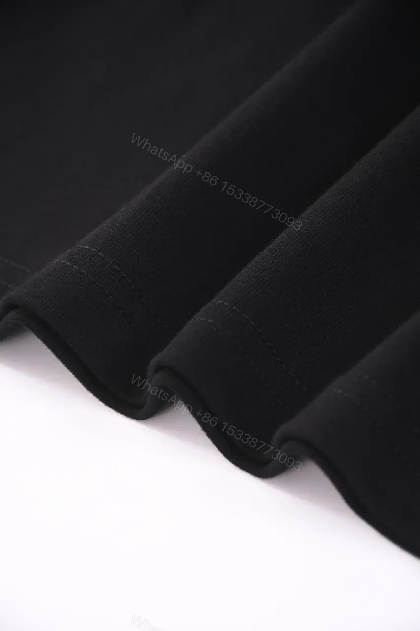 View 8 of Black Cotton Tee — Premium Comfort, Subtle Signature Detail, Modern Fit