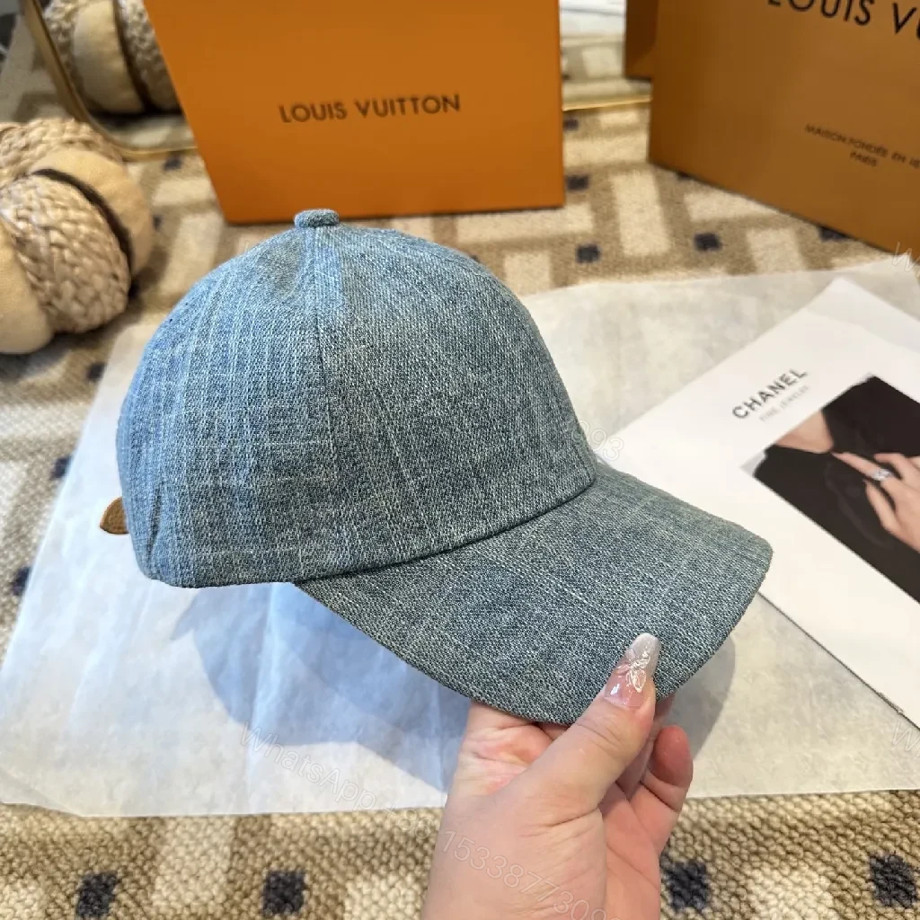 View 6 of Denim-Textured Cap with Subtle Luxury Emblem