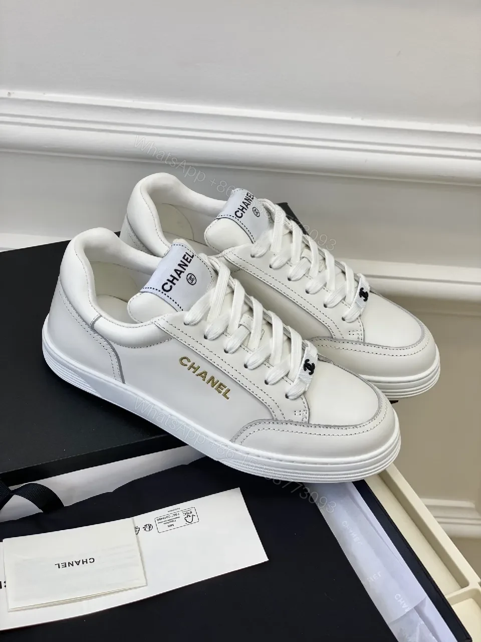 View 3 of White Leather Sneakers: Minimalist High-Tops with Gold Logo