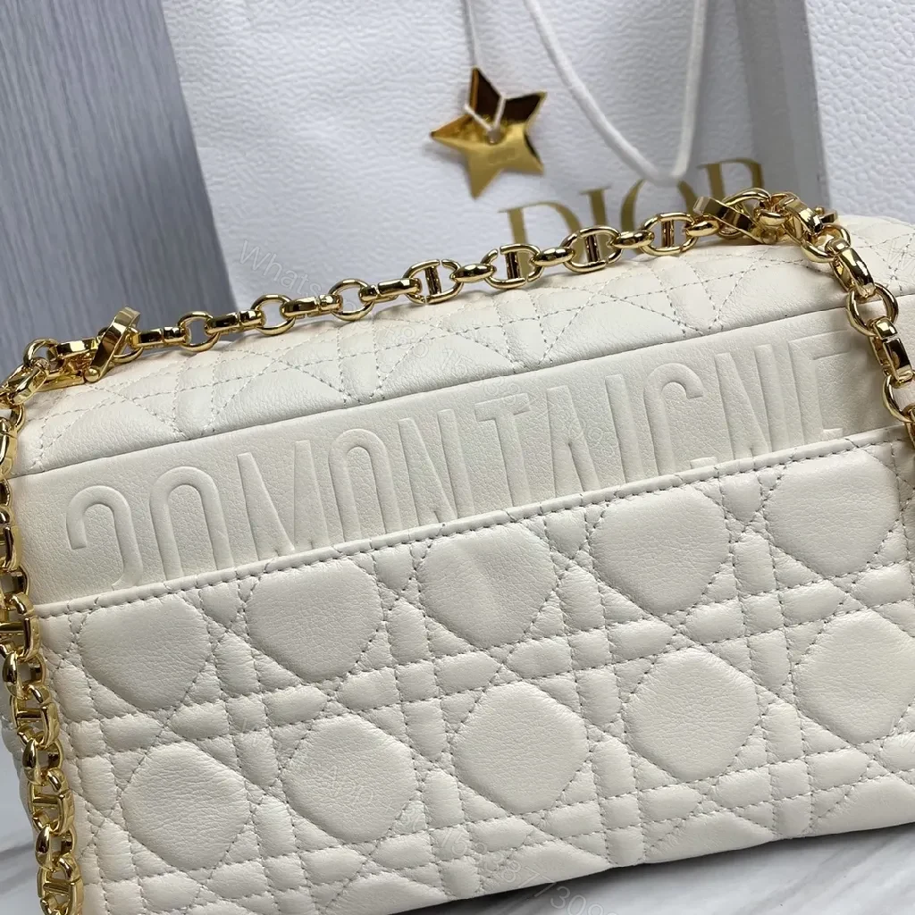 View 4 of Quilted White Leather Mini Bag: Gold-Accented Luxury