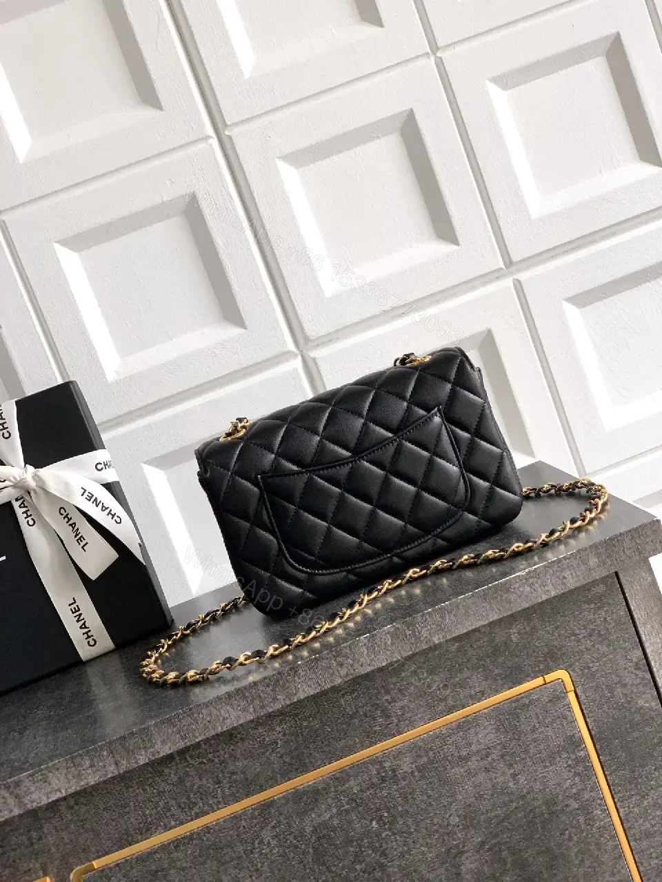 View 6 of Quilted Black Leather Crossbody: Golden Turn-Lock Charm Bag