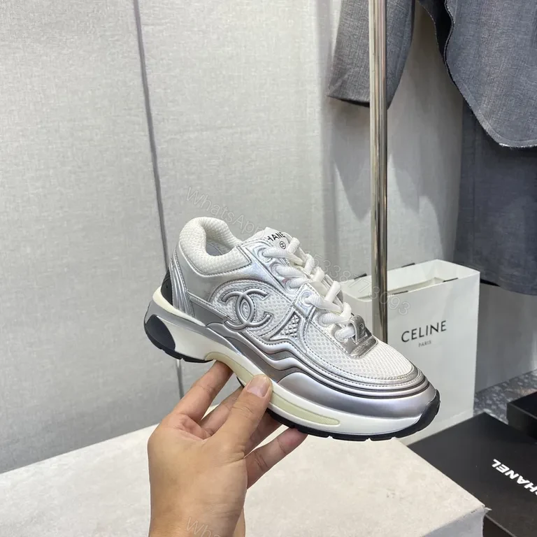 Silver Sonic: Modern Luxe Sneaker with Chanel-Inspired Logo — view 1