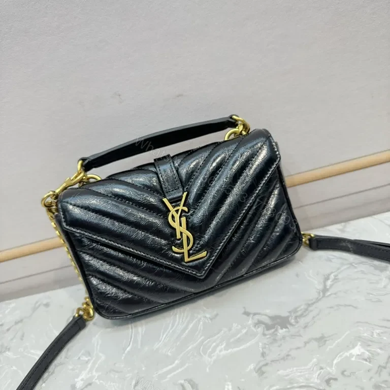 View 2 of Structured Quilted Leather Handbag with YSL Crest