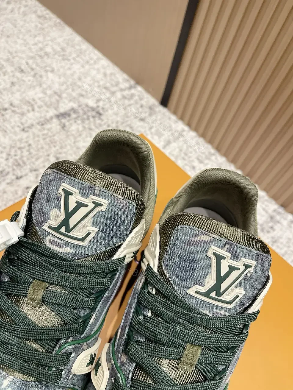 View 3 of Denim Textured Sneaker with LV Detailing, Modern Couture Outdoors