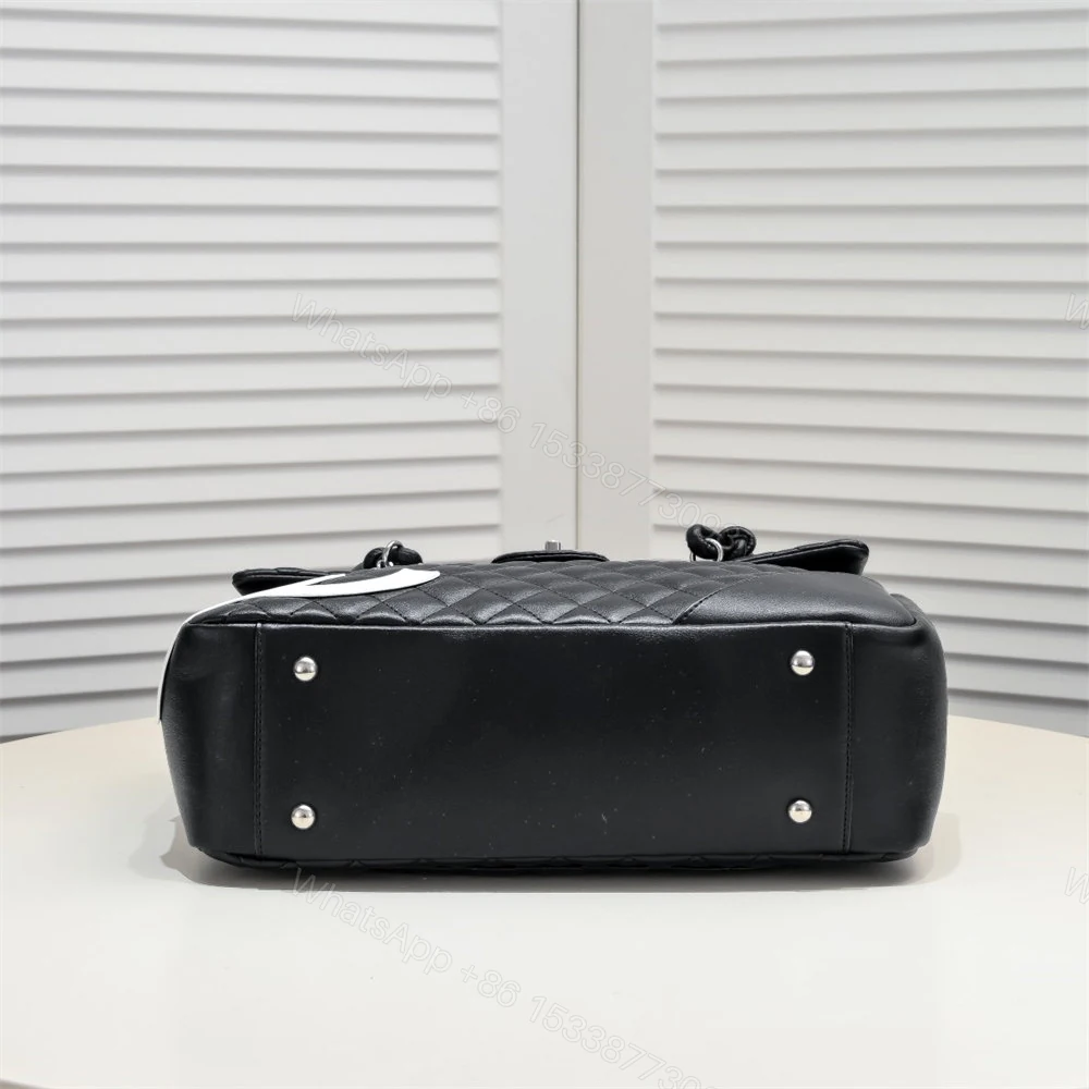 View 4 of CHANEL Black Lambskin Cambon Handbag