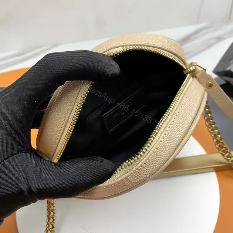 View 6 of Quilted Circular Crossbody Bag with Gold-YSL Emblem