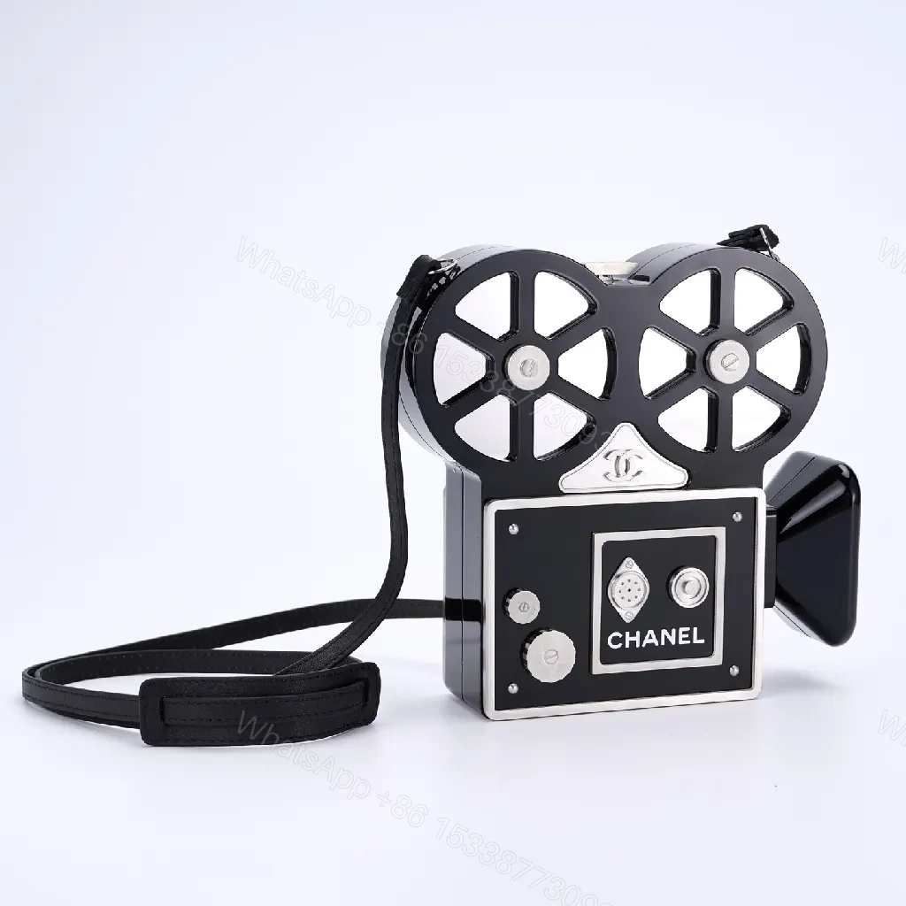 Compact Reel-Clutch: Lux Gloss Hardware with Architectural Silhouette — view 1