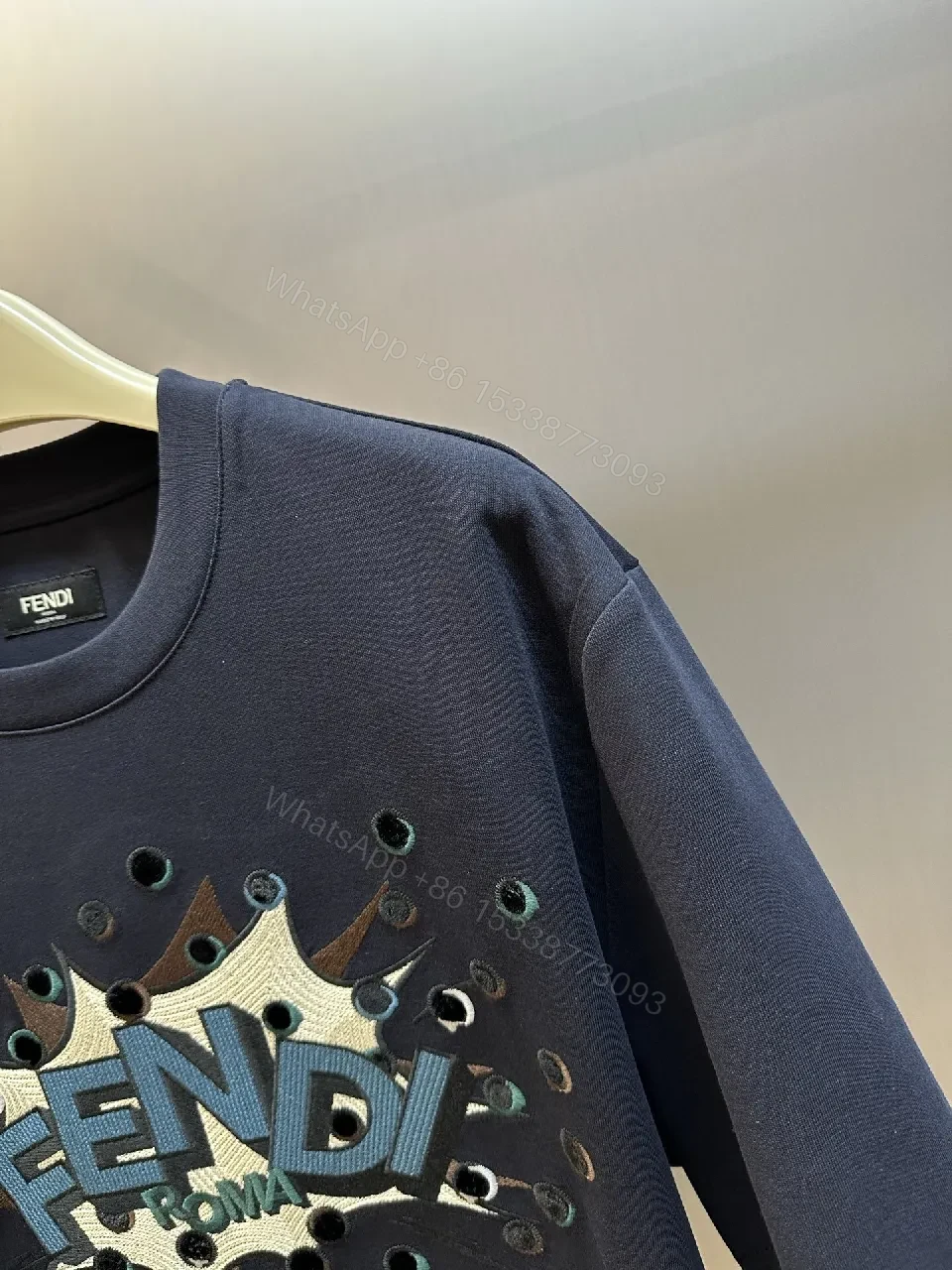 View 6 of Bold Logo Grafitti Tee: Premium Cotton, Cutouts, Navy