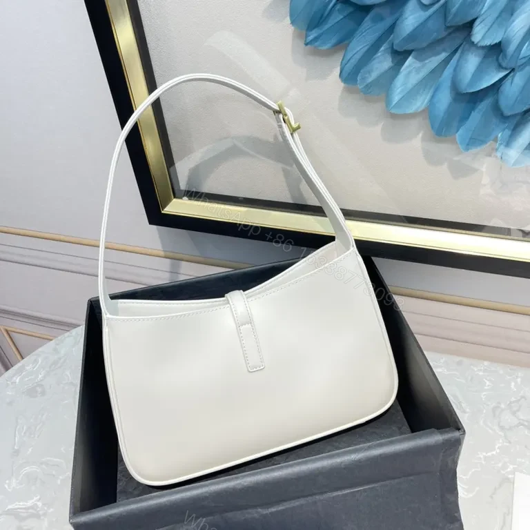 View 2 of Minimalist White Leather Handbag with Gold YSL Accent