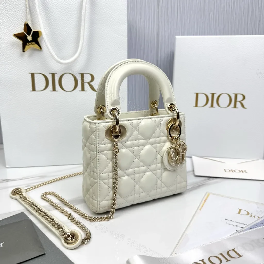 View 3 of Ivory Quilted Mini Handbag with Chain and Charms - Luxury Style