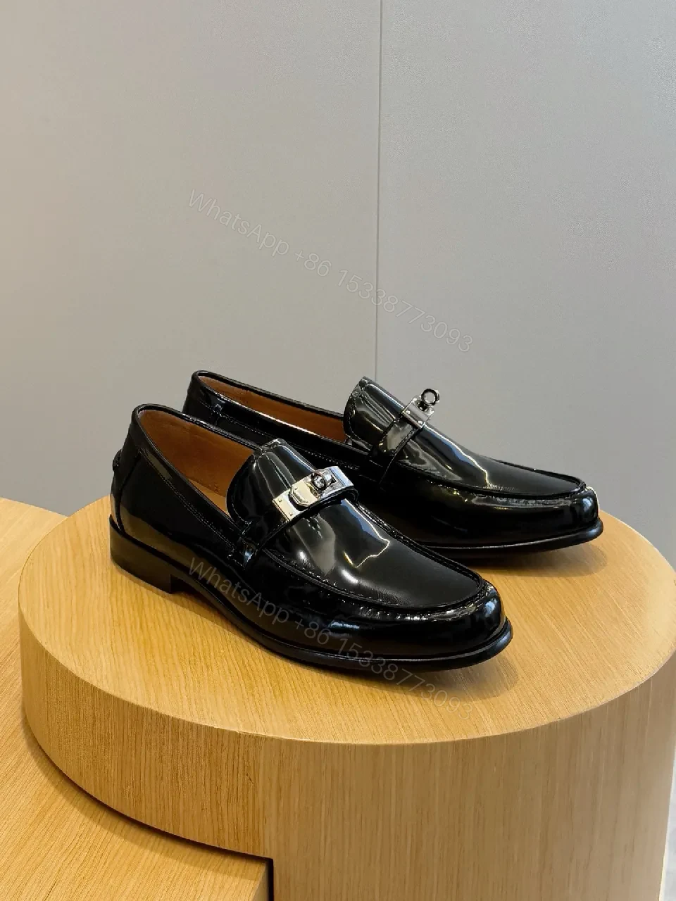 View 7 of Elegant Patent Loafers with Signature Hardware