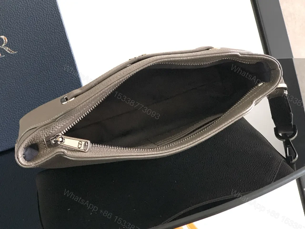View 5 of Grey Leather Matte Dior Clutch with Top Handle and Wrist Strap