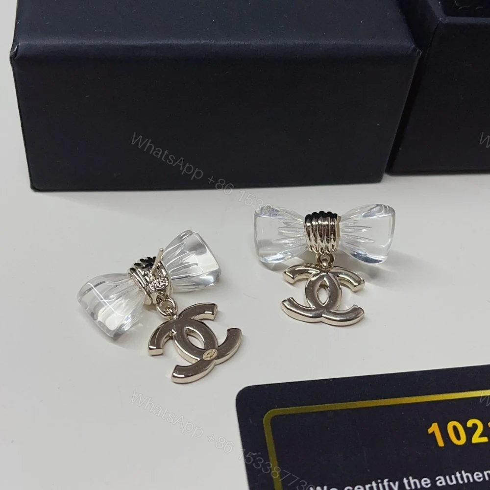 View 4 of CHANEL D25 CC BOW EARRINGS GOLD METAL ABF537 B19997 NAFVG
