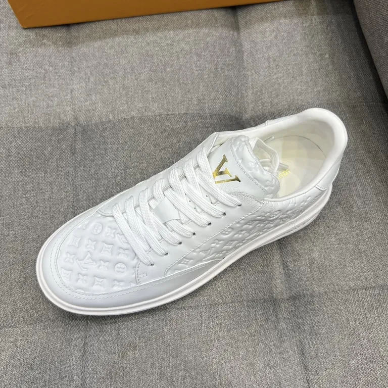 View 4 of White Leather Sneakers with Gold LV Accent, Luxe Everyday