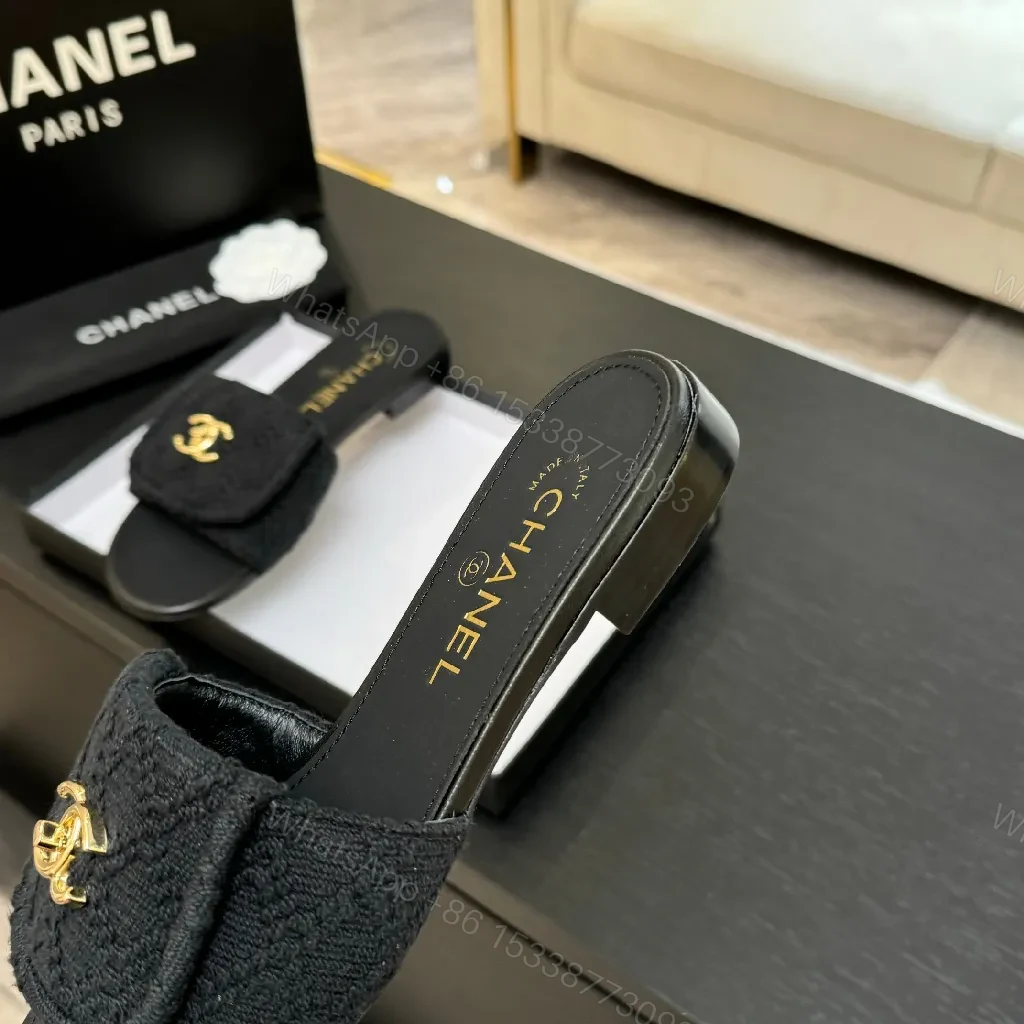 View 4 of Quilted Black Slip-Ons with Gold Logo – Luxury Comfort