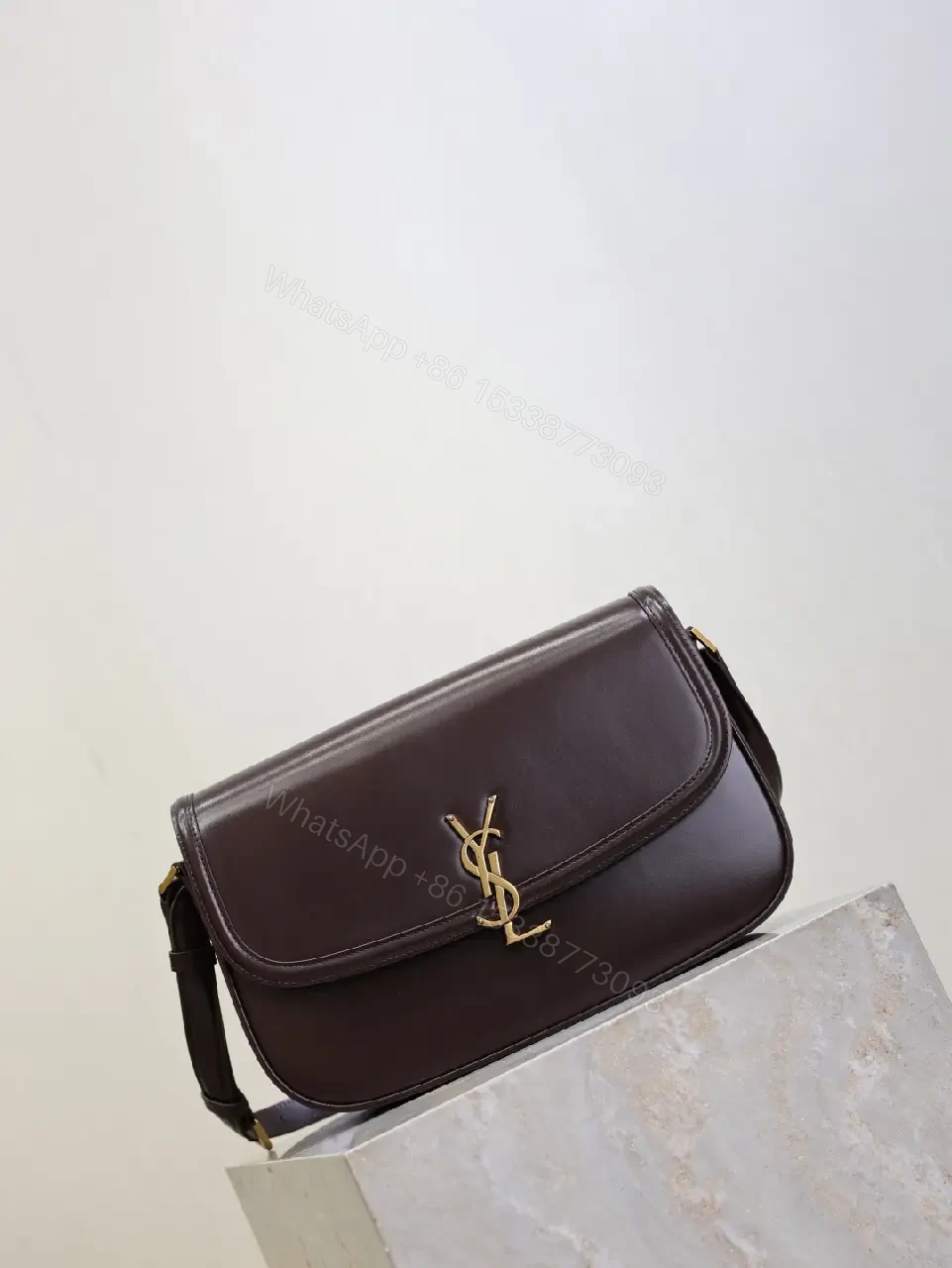 View 2 of Chic Leather Crossbody with Gold-Tone Hardware, Compact Carry