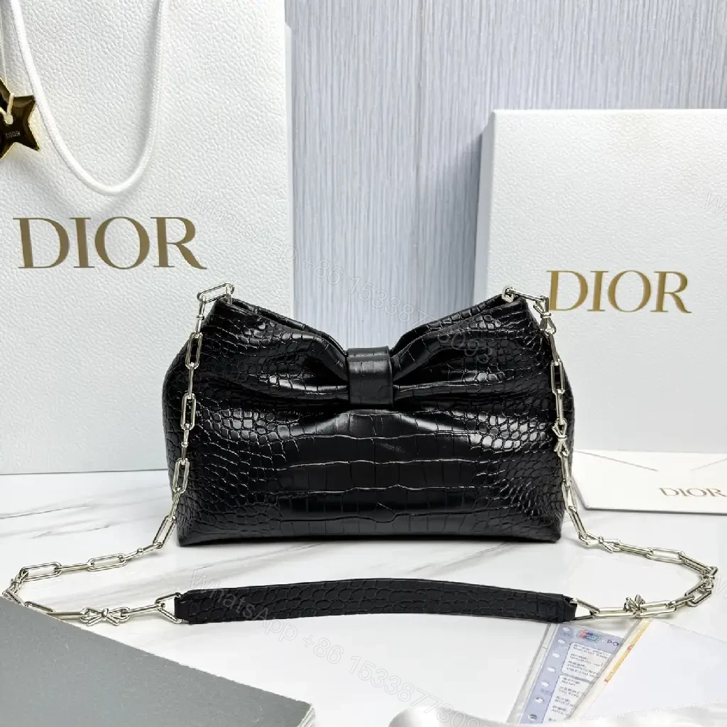 View 3 of Croc-Texture Bow Clutch: Leather Luxury, All-Day Glam
