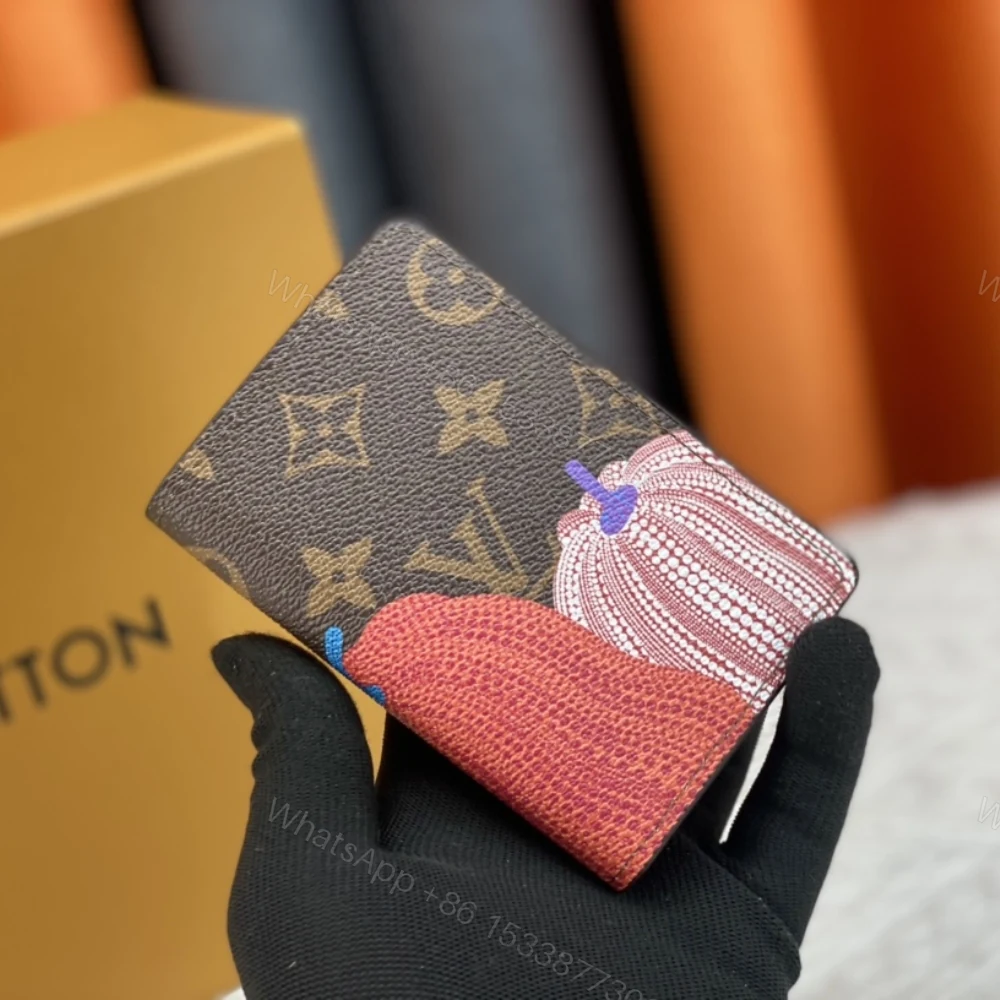View 2 of LOUIS VUITTON VERTICAL WALLET x YK PUMPKIN MONOGRAM ECLIPSE CARD HOLDER BROWN 9CM