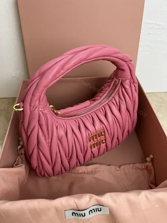 View 7 of Pink Quilted Miu Miu Mini Bag â€“ Luxury Everyday Chic