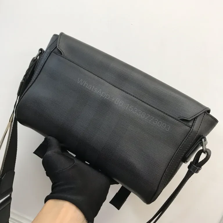 View 2 of Structured Black Burberry Crossbody: Subtle Texture, All-Day Carry