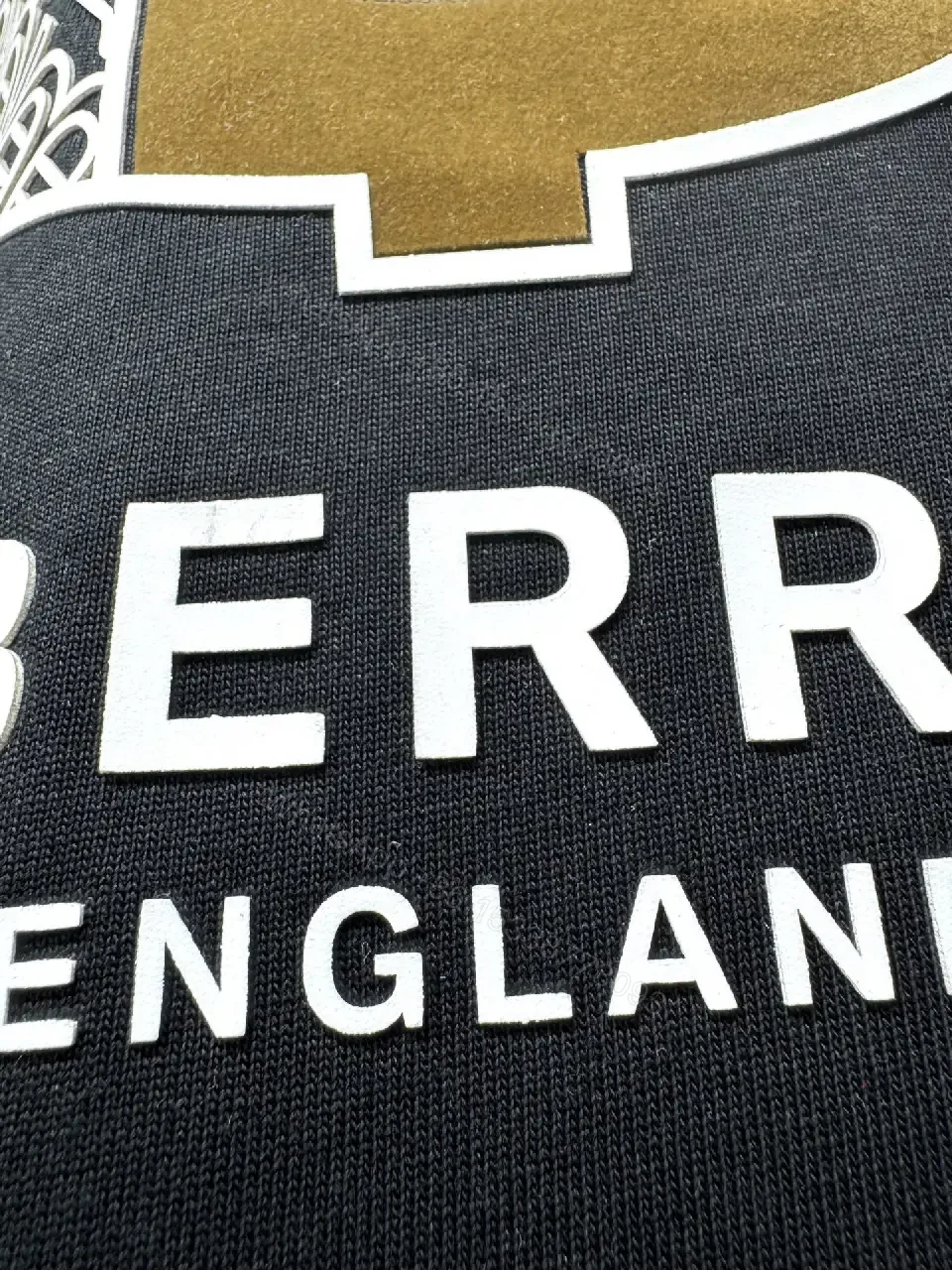 View 6 of Statement Black Cotton Tee with Bold Metallic Logo Detail