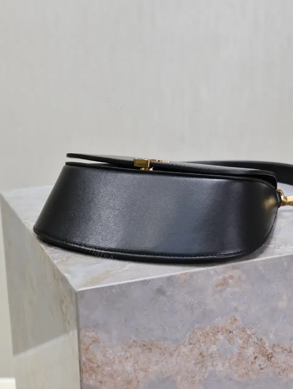 View 7 of Structured Leather Crossbody with Gold Emblem, Compact & Versatile Bag