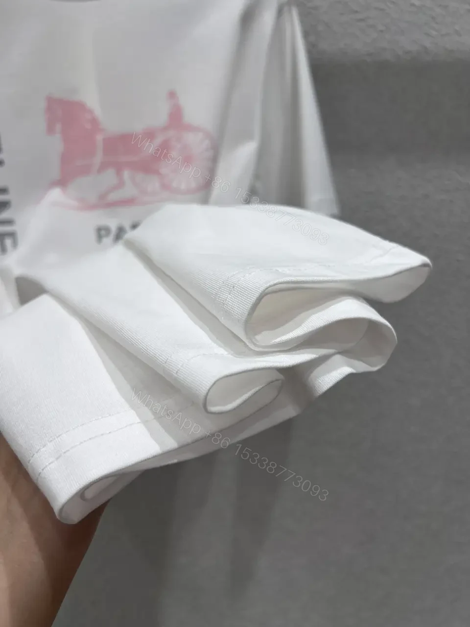 View 8 of Minimalist White Tee — Premium Cotton, Subtle Logo, Modern Style