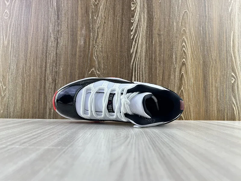 View 2 of Black & White Contrast Runner with Bold Red Sole Sneakers