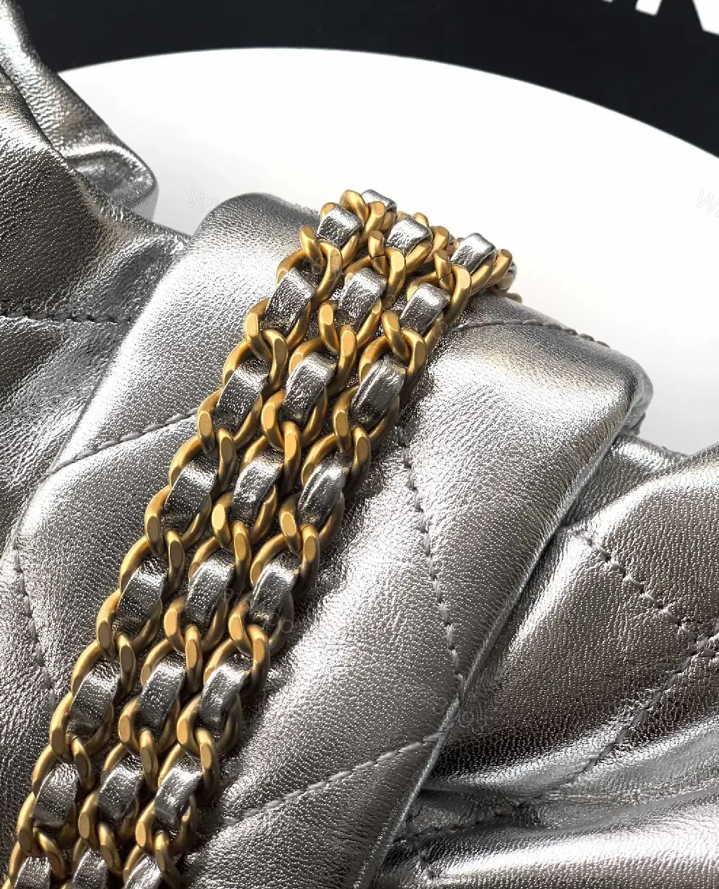View 6 of Metallic Quilted Handbag with Gold Hardware Statement Bag