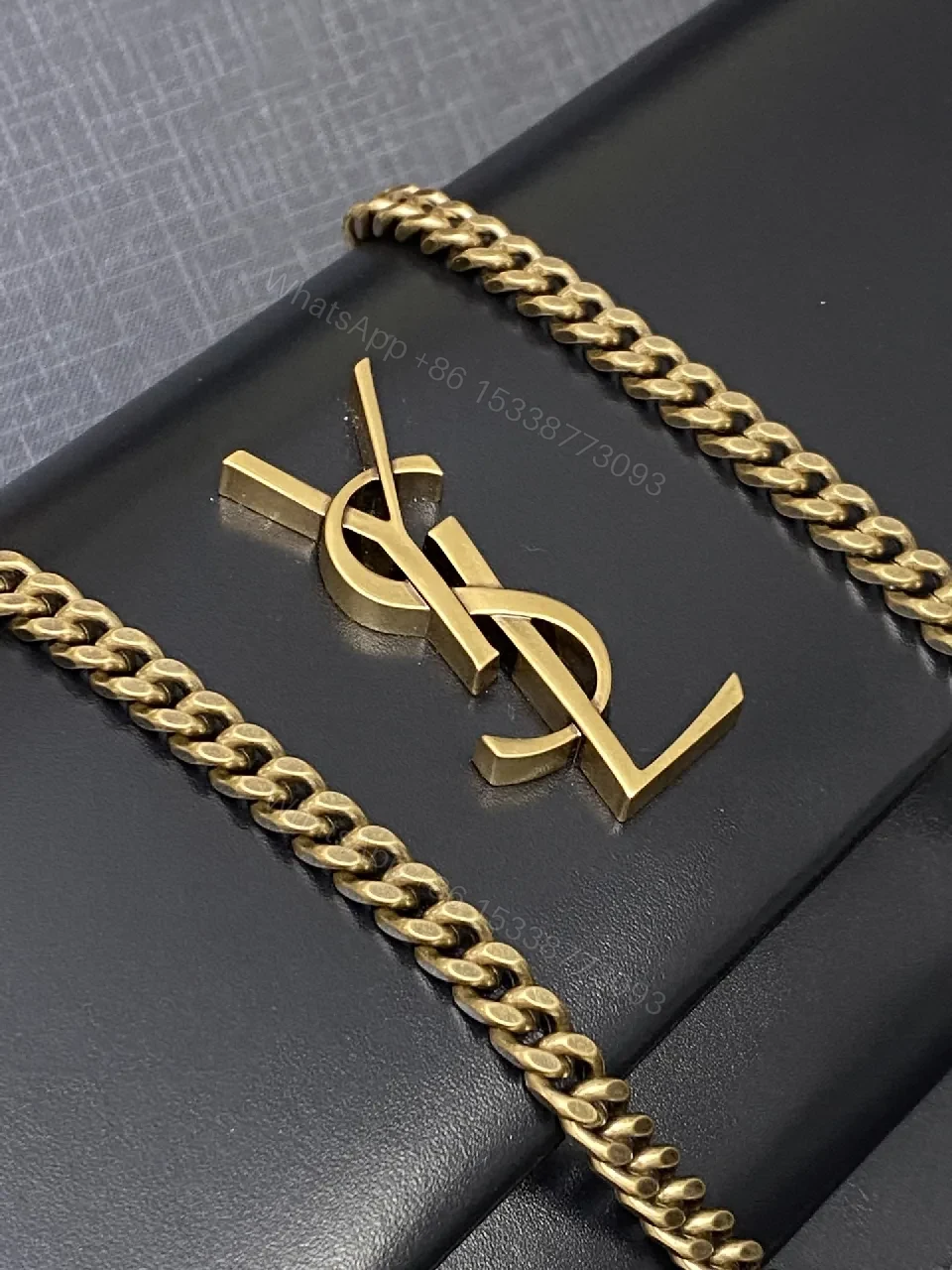 View 5 of Chic Black Leather Shoulder Clutch with Gold Logo