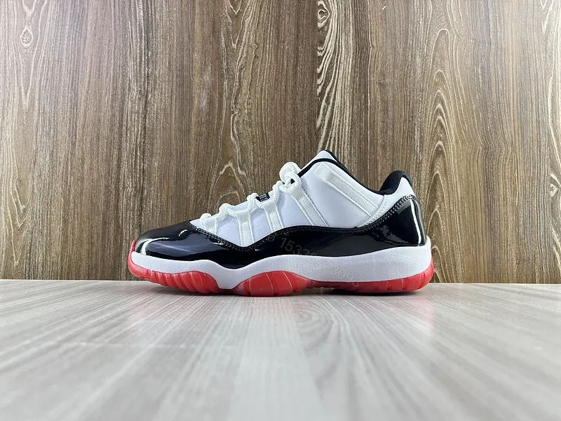 Black & White Contrast Runner with Bold Red Sole Sneakers — view 1