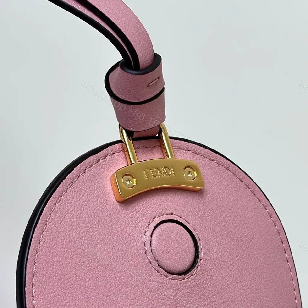 View 9 of Soft Pink Pebbled Leather Mini Satchel – Crossbody Style, Tassel Detail
