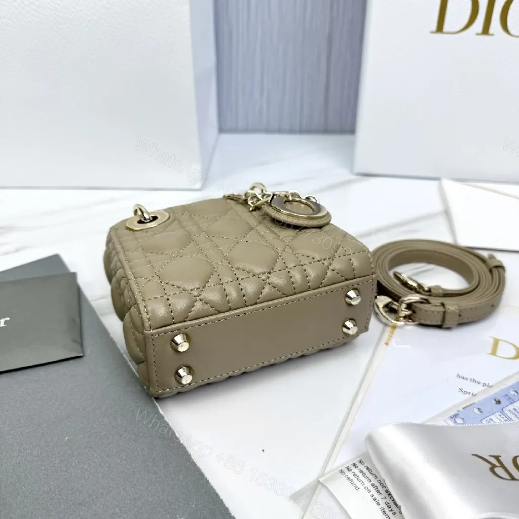 View 5 of Compact Quilted Satchel: Modern Texture, Iconic Details