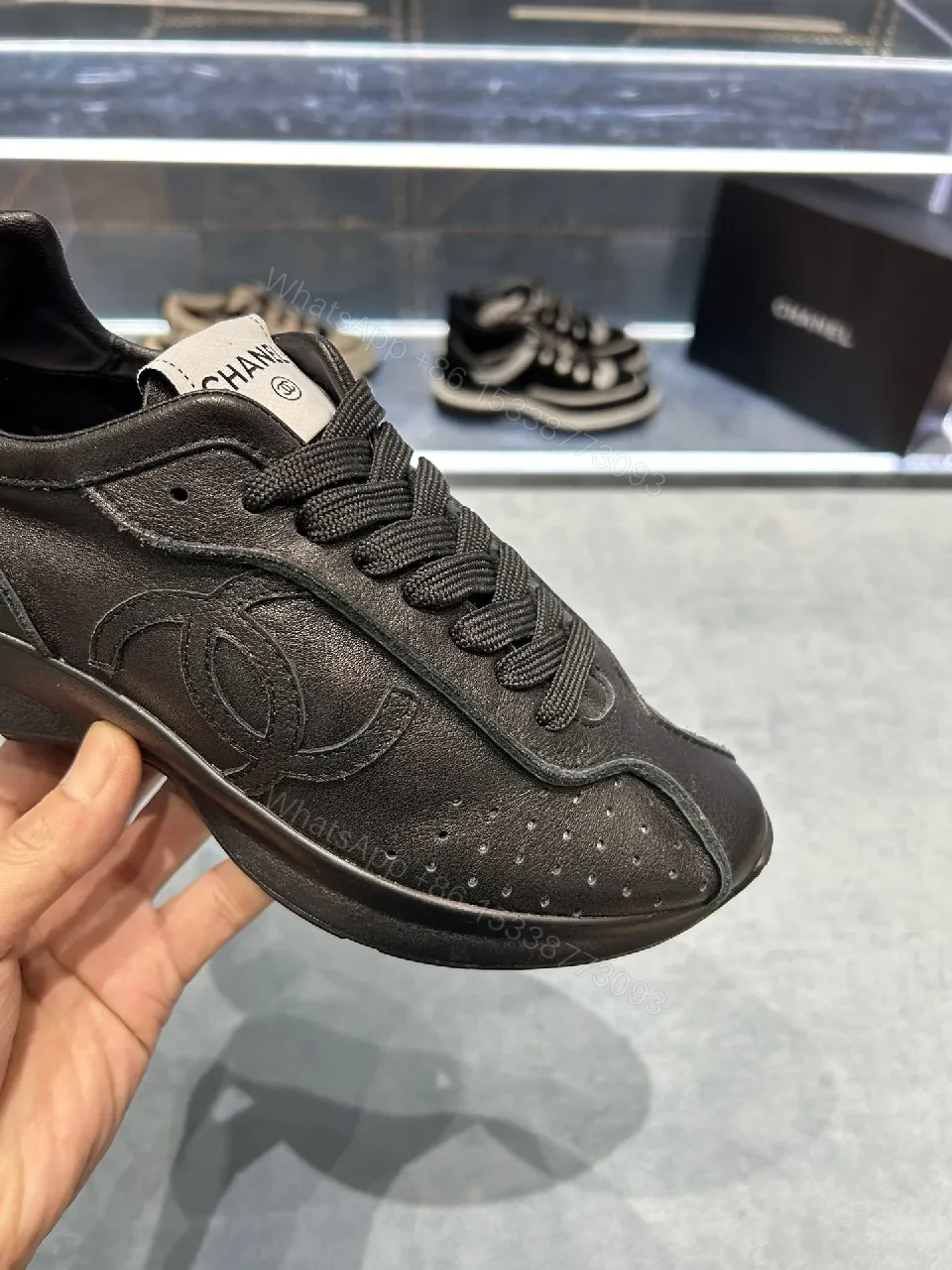 View 4 of Black Leather-Trim Sneaker with Perforations + Luxe Casual Sneakers