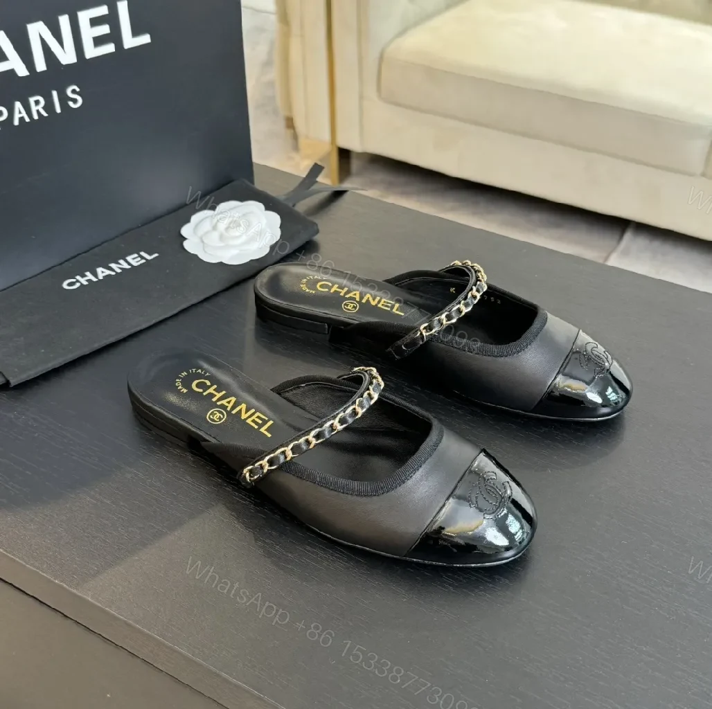 View 3 of Black Leather Slide Mules with Chain Detail - Luxe Casual Calm