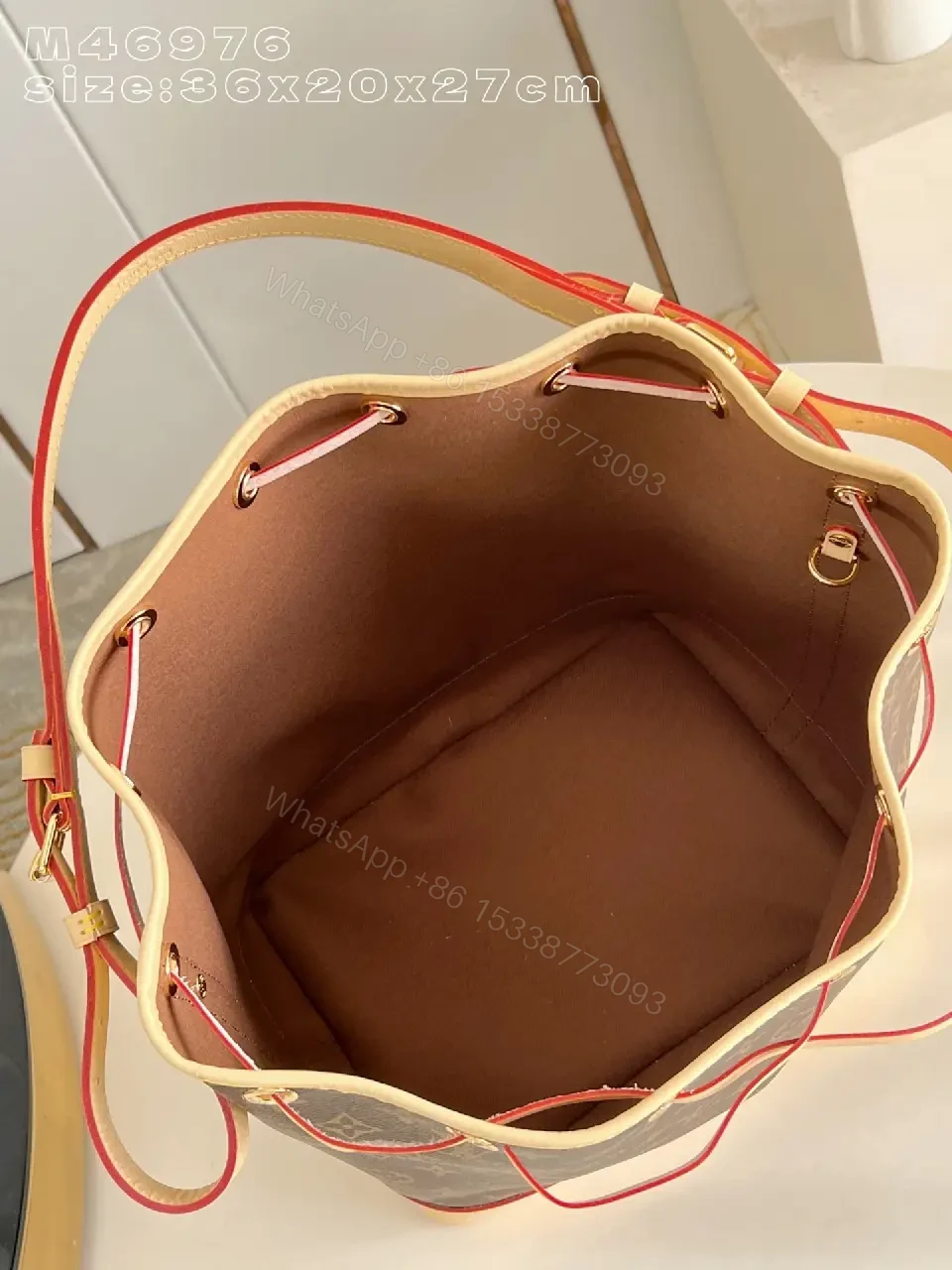 View 4 of Monogram Bucket Bag: Structured Luxury, Everyday Versatility