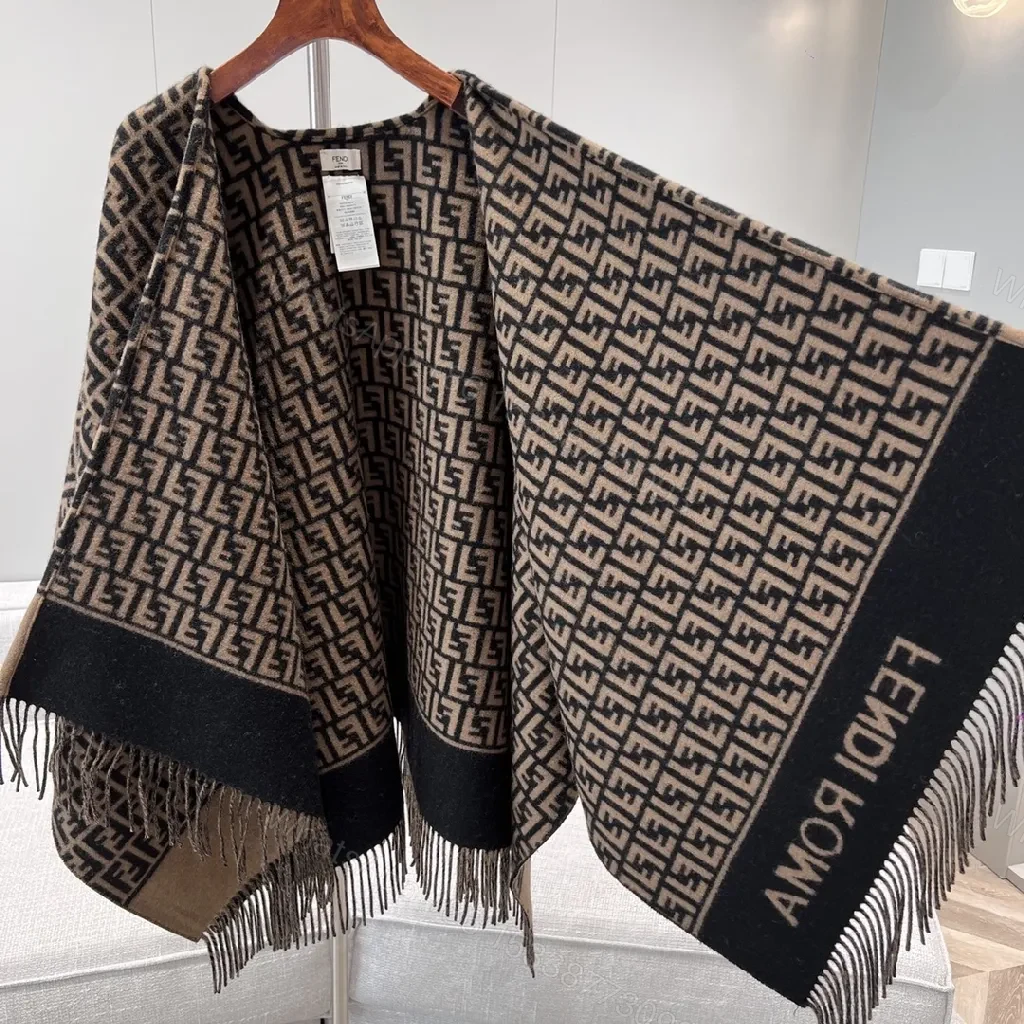 View 8 of Neutral Knit Poncho: Luxe Monogram-Patterned, Fringed, All-Season