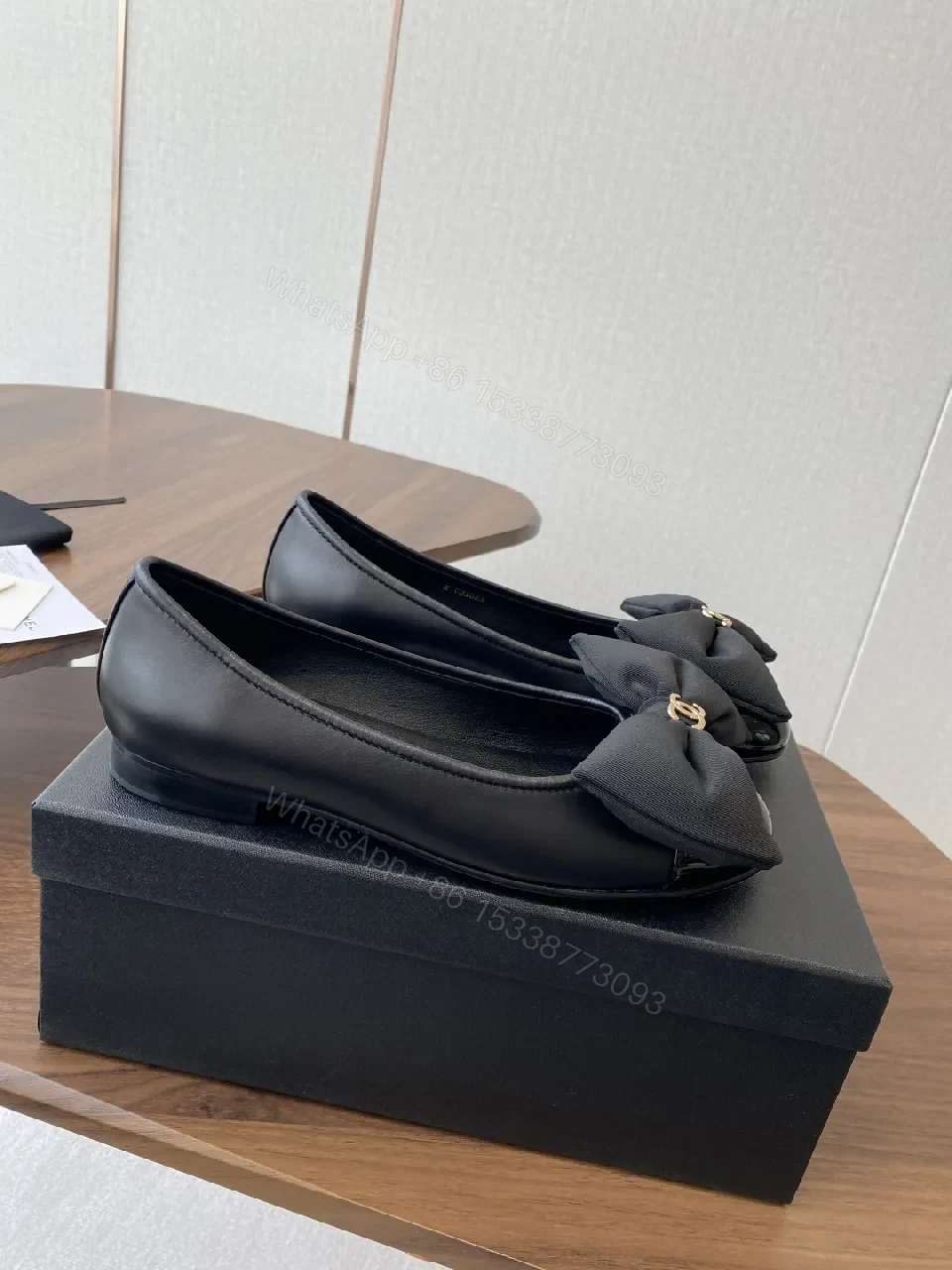 View 6 of Lux Black Leather Bow Flats with Gold Hardware