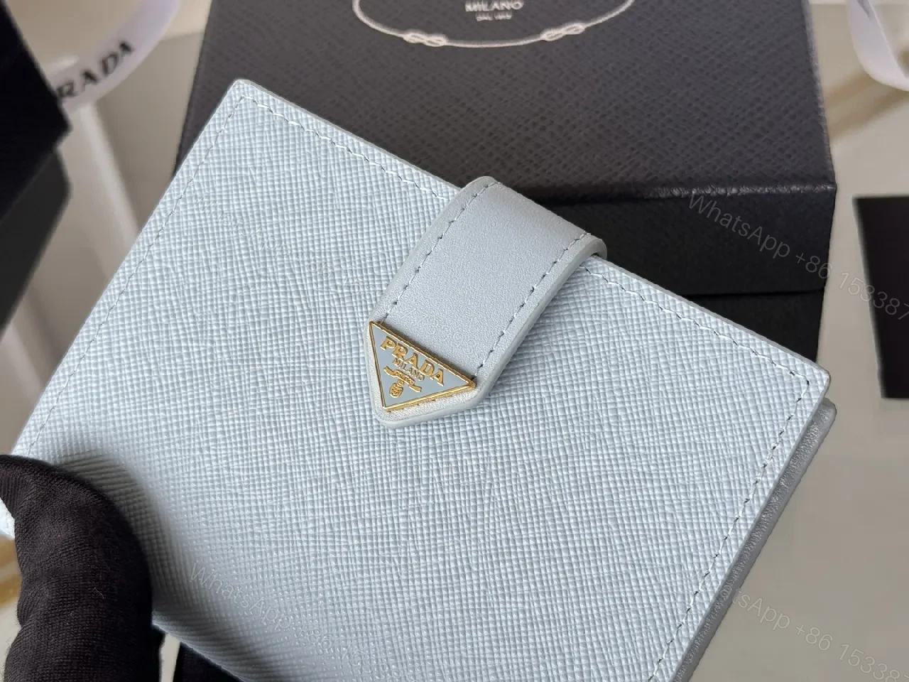 View 11 of Blue Saffiano-Like Bifold Wallet with Triangle Closure, Minimal Luxury