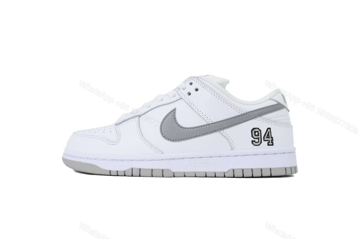 View 9 of Nike Supreme x Dunk Low SB 'White Metallic Silver' HQ8487-100