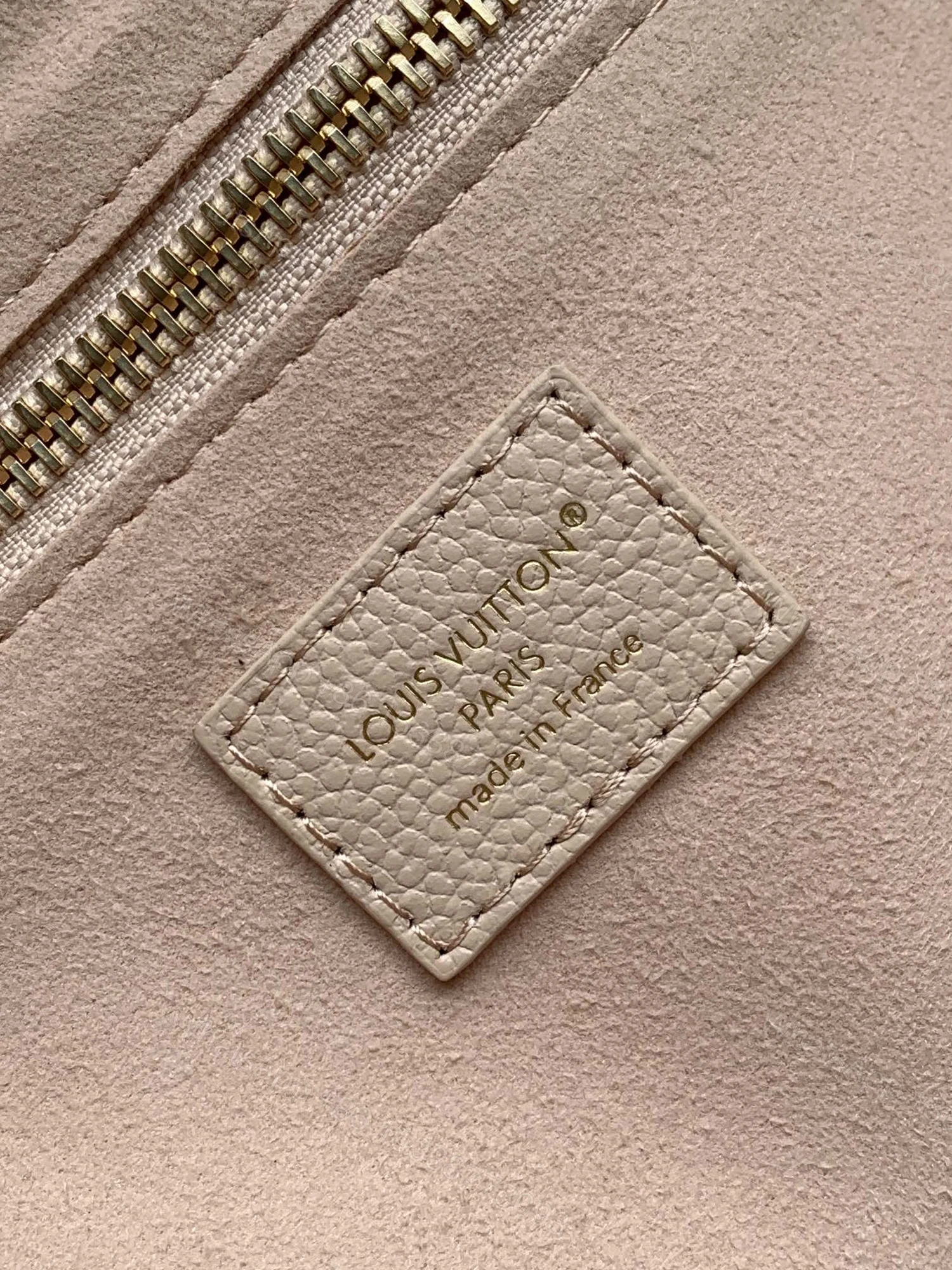 View 8 of LV NEVERFULL 32 LIGHT BEIGE MONOGRAM EMPREINTE LEATHER