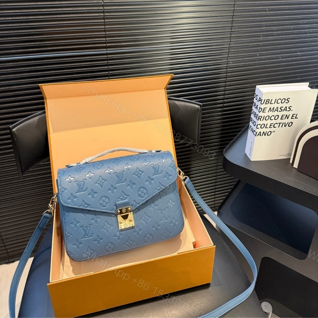 View 9 of Louis Vuitton Pochette Métis Monogram Empreinte Bleu Jean 25cm M27357