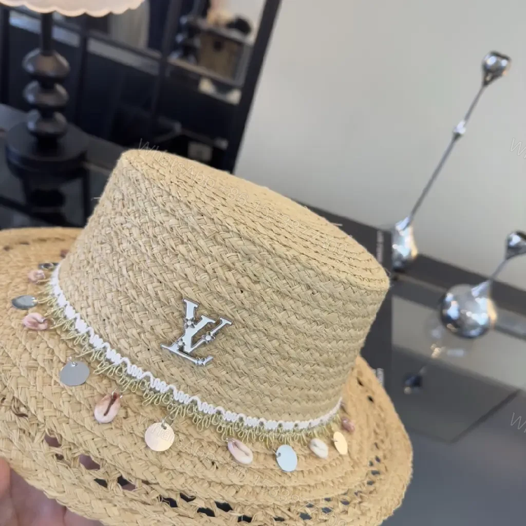 View 2 of Natural Beige Straw Boater Hat with Silver LV Charm, Chic Wide Brim