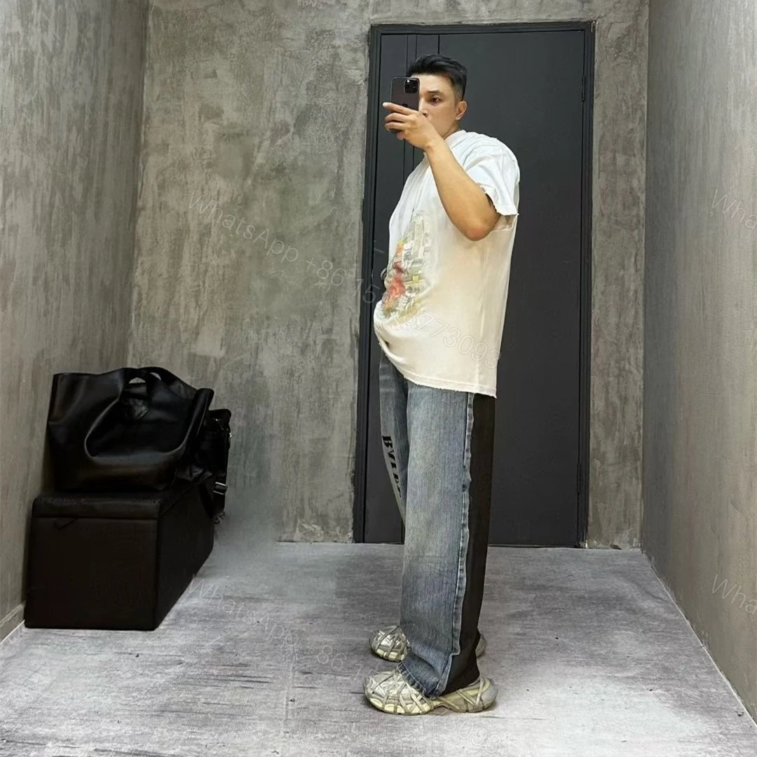 View 15 of 高仿Balenciaga*SS24系列783697塗層字面牛仔褲