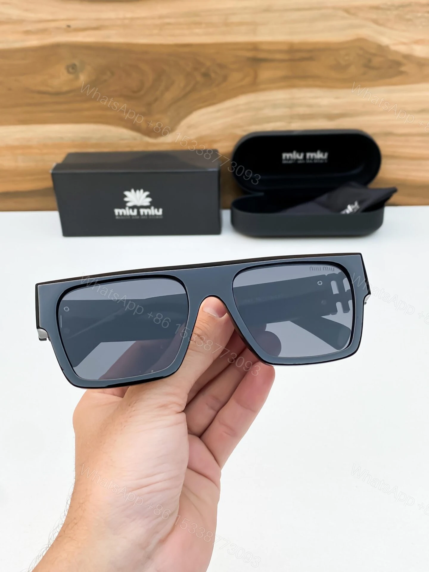 View 2 of Miu Miu Square Black Sunglasses