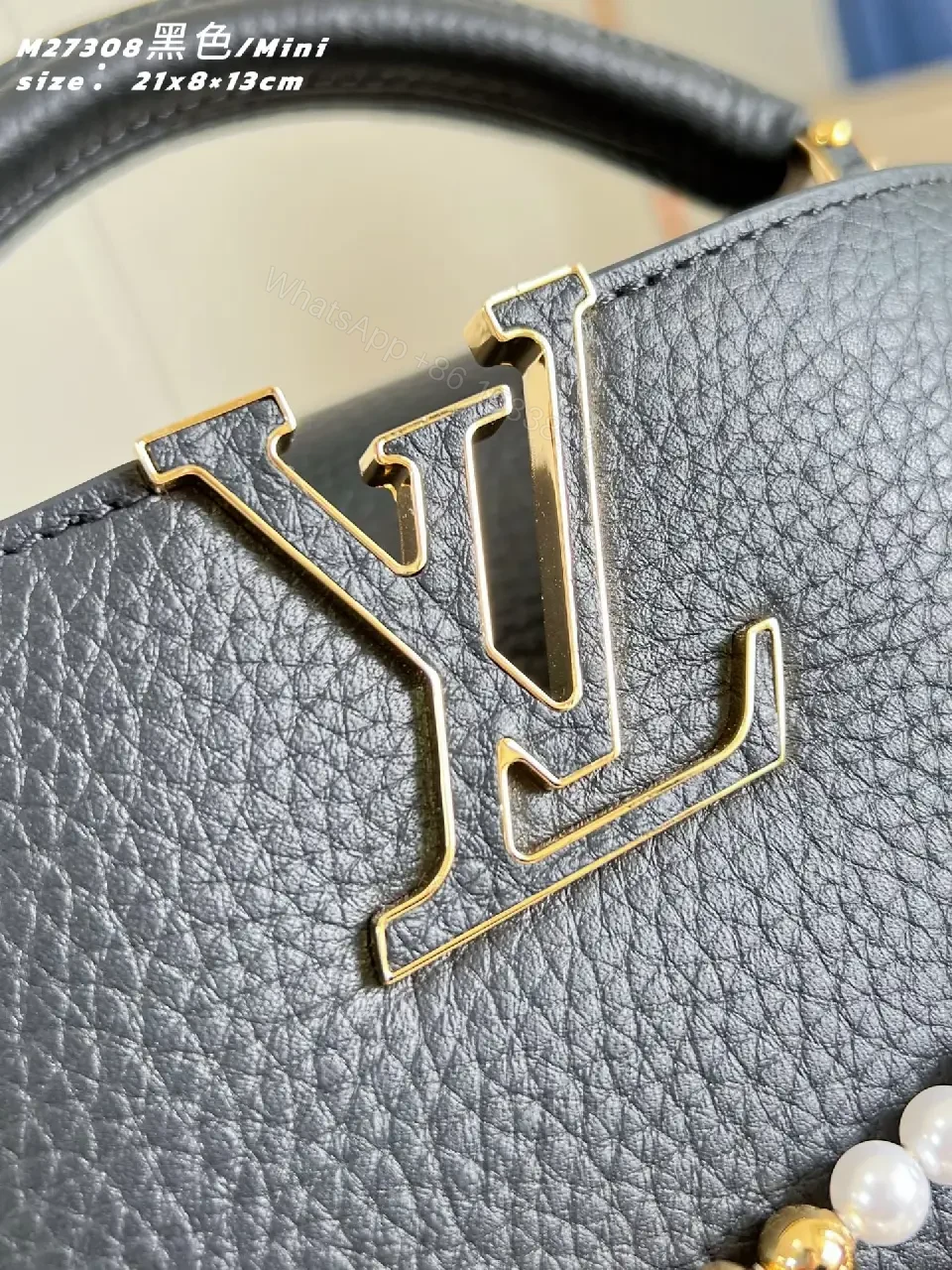 View 5 of Luxurious Mini Bag: Pebbled Leather, Layered Chains, Crossbody Embellishments
